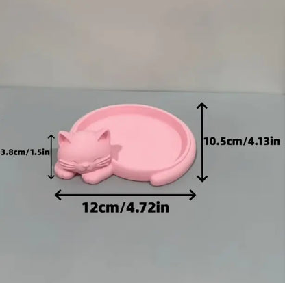 Pink cat desktop storage tray for jewelry (earrings, rings, necklaces, bracelets), keys, and a red sticky note holder.